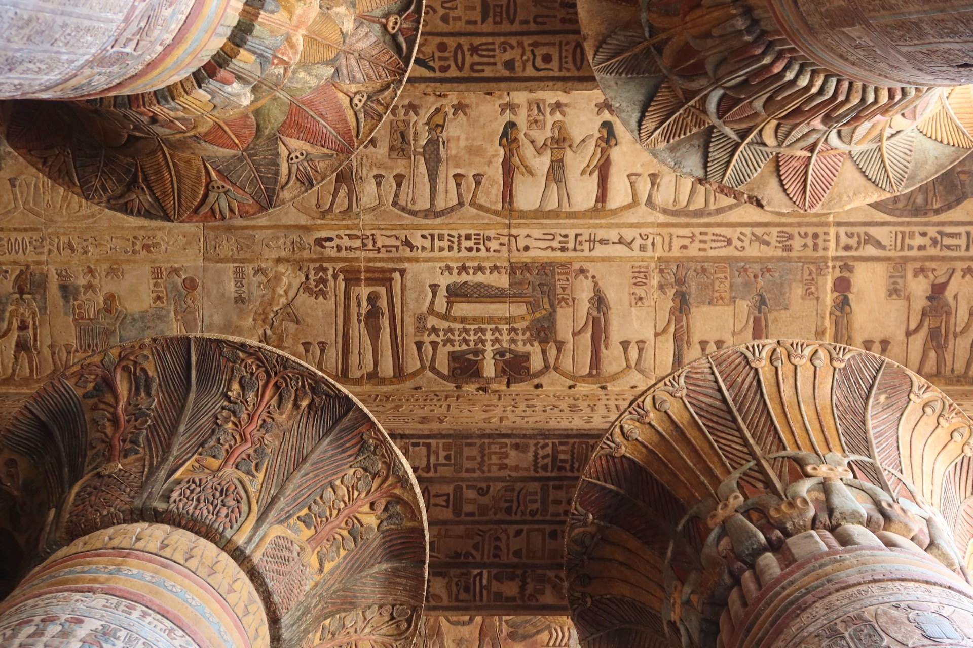 Beautiful colorful inscriptions on the walls and ceiling of Khunum temple in Esna in Luxor